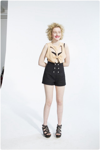 Blonde woman black shorts black - a bow free wallpaper