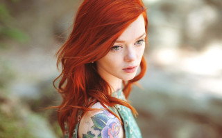 Woman red hair flower serious 3 - serious free wallpaper for desktop