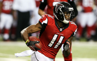 Football player running ball helmet 2 - dr. atl free wallpaper