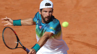 Man swinging tennis racket ball 2 - david lazar free wallpaper
