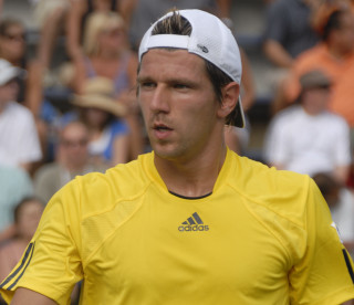 Yellow shirt man tennis racket - rutkowski free wallpaper