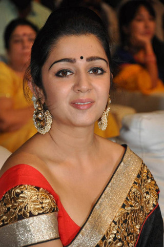 Woman red gold sari smiling - free sports wallpaper