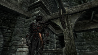 Man black outfit stone building - daryush shokof free wallpaper