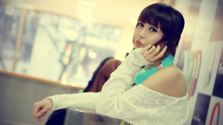 Woman white sweater talking cell - a cell phone free wallpaper