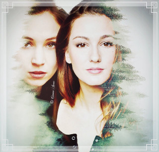 Two women posing picture frame - a picture frame free wallpaper