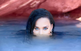 Woman blue eyes water rock - david lachapelle free wallpaper