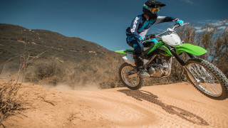 Dirt bike desert road mountain - a dirt road in the desert free wallpaper