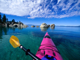 Kayak water rocks trees lake - clear blue water free wallpaper