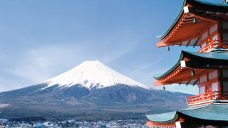 Tall building mountain sky clouds 2 - a mountain in the background and a sky background free wallpaper