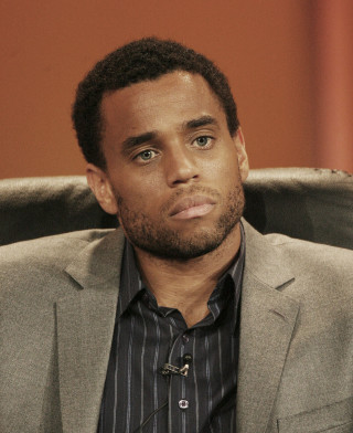 Man suit serious chair looking - david brewster free wallpaper