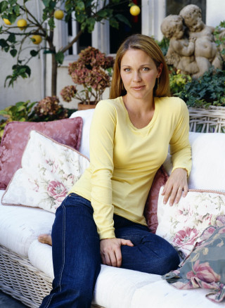 Woman sitting couch flowers yellow - alison debenham free wallpaper