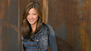 Woman jean jacket rusty wall - letterism free wallpaper