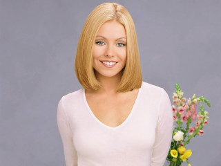 Blonde woman smiling flower vase - holding free wallpaper