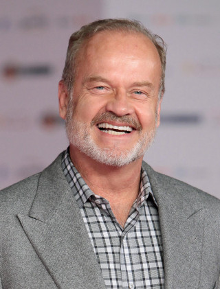 Bearded man smiling gray suit - ross free wallpaper