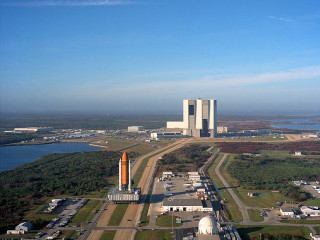 Rocket field city lake building - aerial free wallpaper