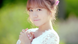Woman flower hair white dress 5 - a pink flower free wallpaper