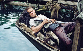 Man boat dog lap dog - a man in a boat free wallpaper
