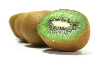 Kiwi fruit cut half white - 4k uhd image free wallpaper