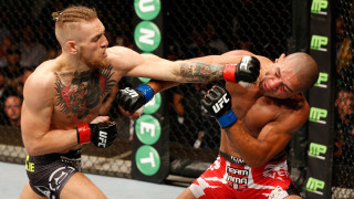 Two men cage fighting hands - a cage free wallpaper
