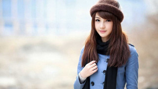 Woman blue coat hat scarf - a scarf free wallpaper