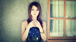 Woman standing window hands folded 2 - her chest free wallpaper