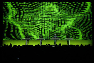 Man stage large screen microphone - number free wallpaper