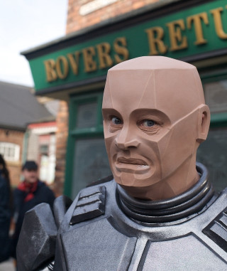 Cardboard head man suit storefront - outside free wallpaper