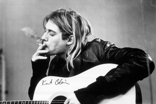 Man smoking cigarette holding guitar - a man smoking free wallpaper