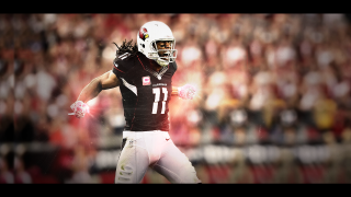 Football player running with ball 10 - his hand and a crowd free wallpaper