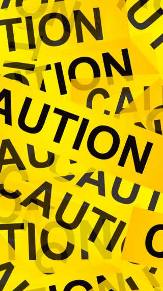 Caution signs stacked pile table - excessivism free wallpaper