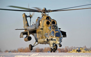 Helicopter flying snowy field trees - 100mm free wallpaper
