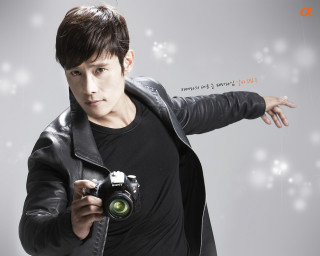 Man holding camera pointing white - choi buk free wallpaper