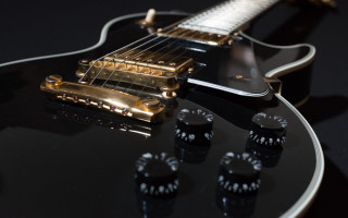 Black guitar gold neck pickers - metal free wallpaper