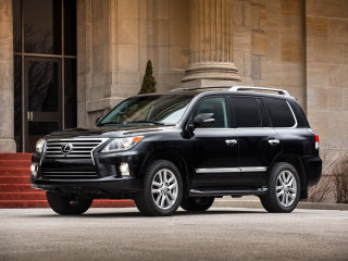 Black suv parked building steps - a black suv free wallpaper