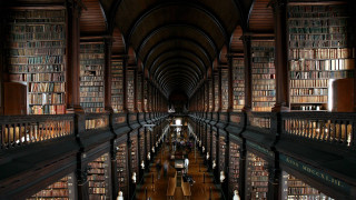 Long library bookshelves people sitting - amazing free wallpaper