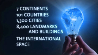 Person holding lightbulb world map - buckminster fuller free wallpaper