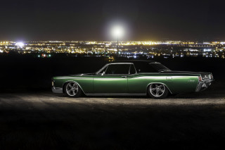 Green car parking lot night - dark shadow free wallpaper