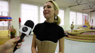 Woman corset talking reporter room - amalia lindegren free wallpaper