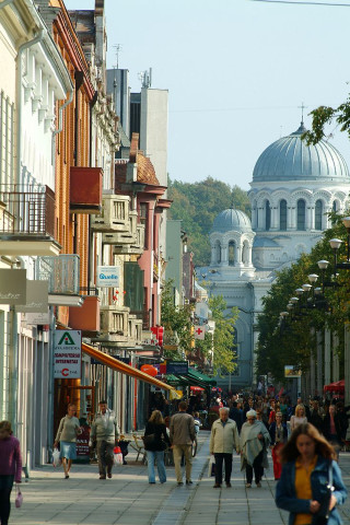 People walking street tall buildings - boleslaw cybi free wallpaper