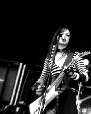 Woman guitar microphone stand performance - a guitar free wallpaper