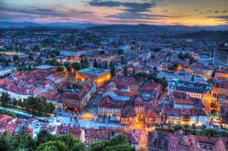 City night buildings lights mountain - alen divi free wallpaper