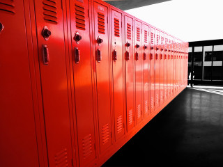 Red lockers person standing background - the background in the distance free wallpaper