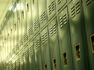 Lockers hallway light person doorway - institutional free wallpaper