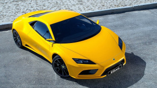 Yellow sports car beach parking - sand free wallpaper