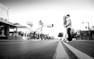 Couple people standing street building - a building in the background free wallpaper