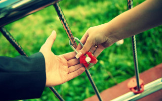 Person handing red string bike - a piece free wallpaper