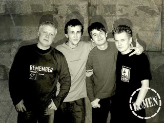 Men graffiti wall group standing 2 - graffiti free wallpaper