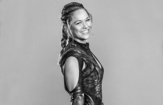 Woman leather dress smiling black - verdadism free wallpaper