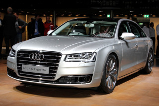 Silver car showroom people looking - a silver car free wallpaper