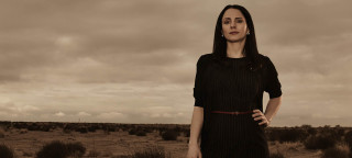 Woman desert cloudy sky landscape - serial free wallpaper